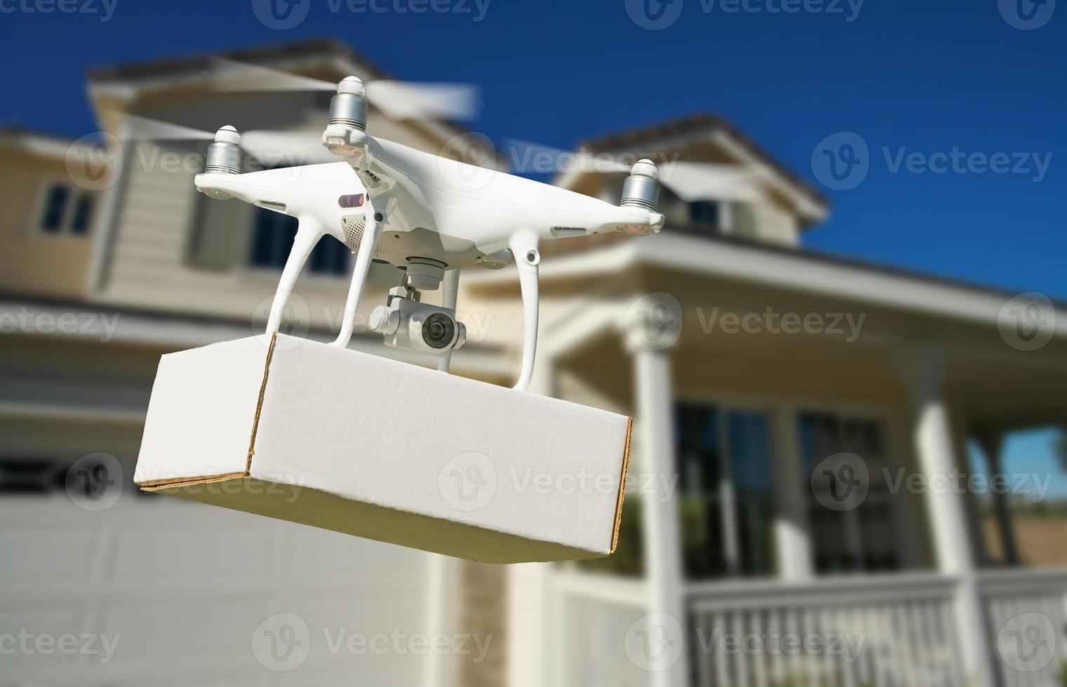 Unmanned Aircraft System Quadcopter Drone Delivering Package At House photo