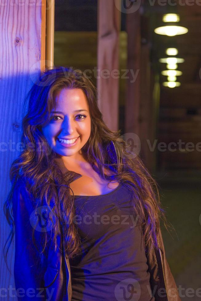 Night Portrait of Pretty Mixed Race Young Adult Woman photo