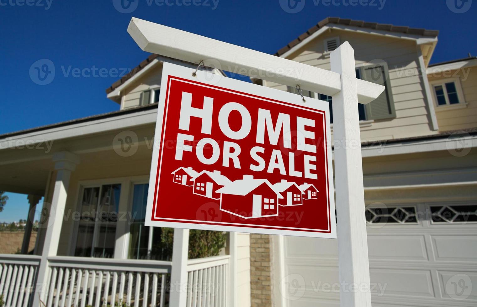 Red Home For Sale Real Estate Sign and House photo