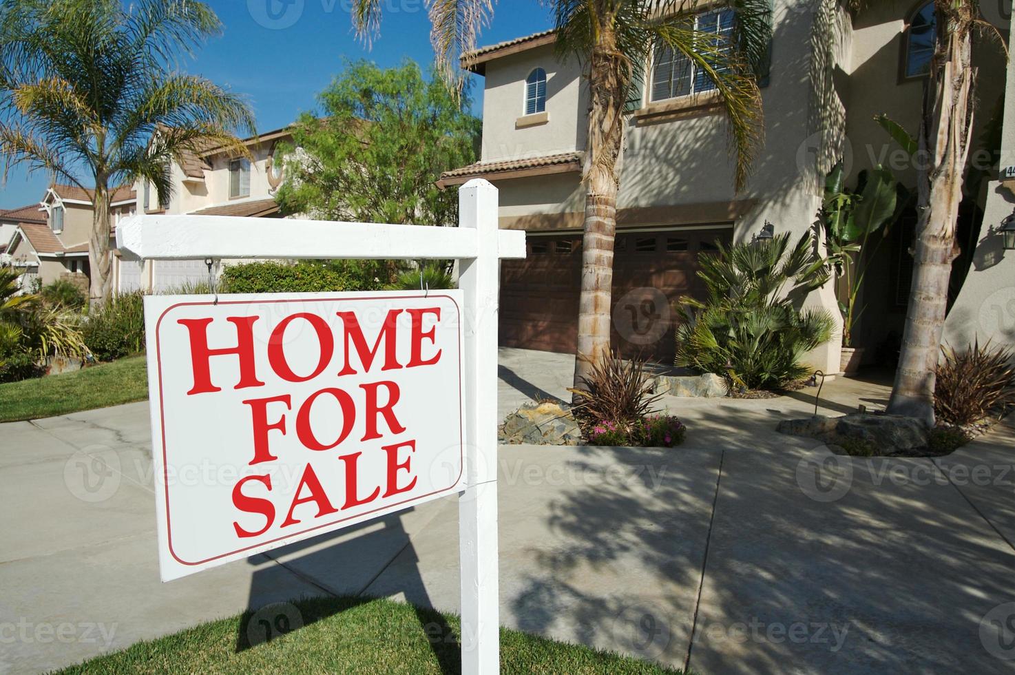 Home For Sale Sign and New Home photo