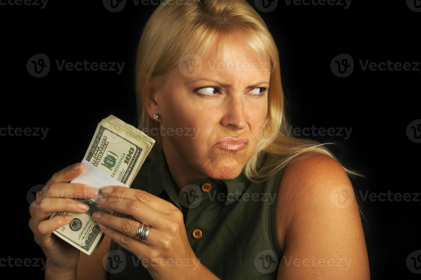 Greed concept with bond woman photo