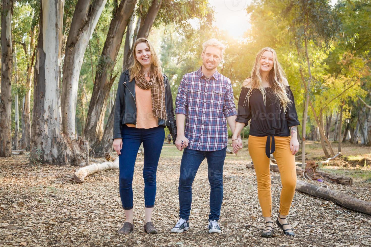 Three Brother and Sisters Portrait Outdoors photo