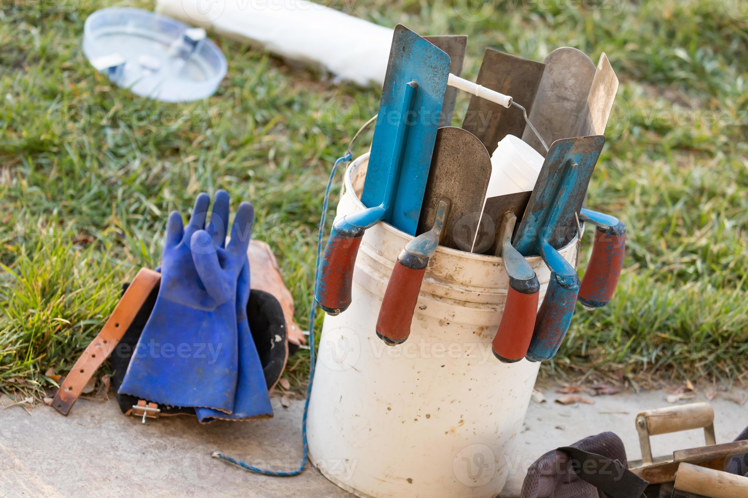 Bucket of Cement Trowels and Tools 16431204 Stock Photo at Vecteezy
