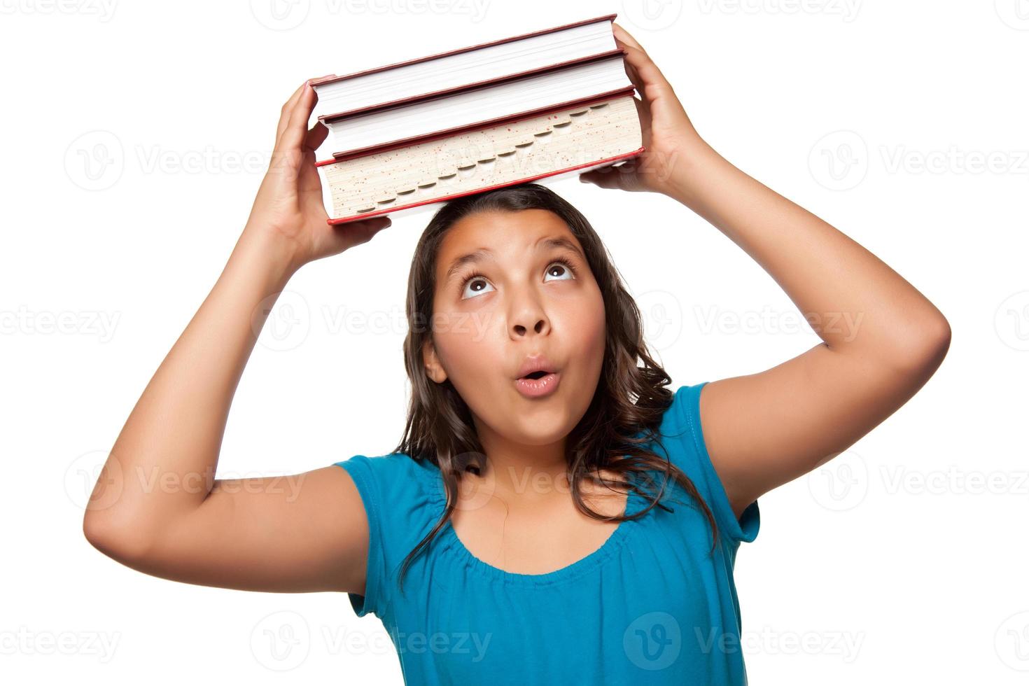 Pretty Hispanic Girl with Books on Her Head photo