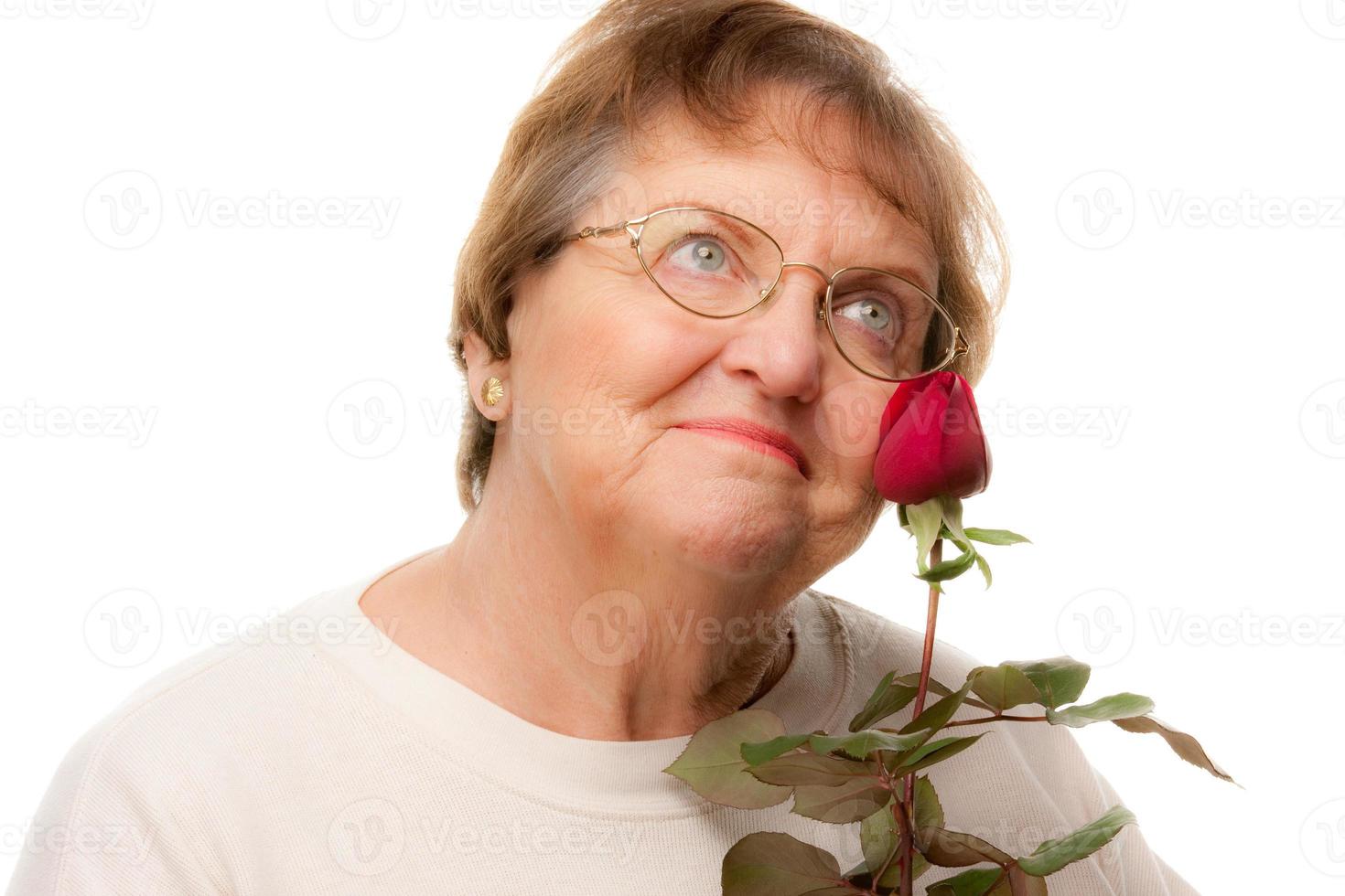 Attractive Senior Woman with Red Rose photo