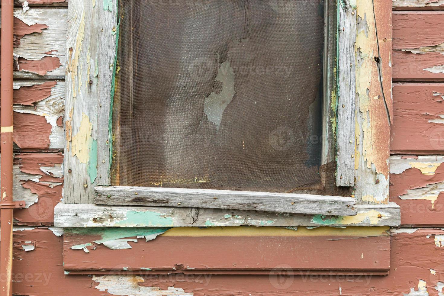 Weathered Wood Panel Wall and Window With Peeling Paint Textured Background photo