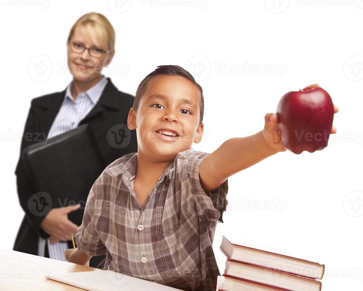 Hispanic Student Boy with Apple and Female Adult Behind. photo