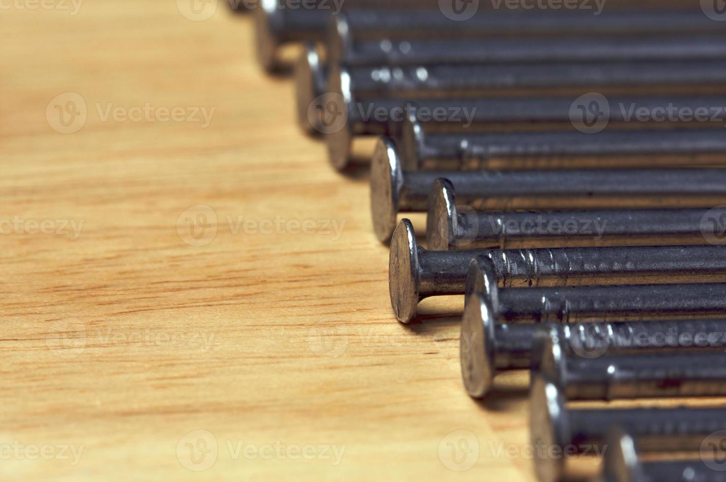 Macro of Nails on Wood photo