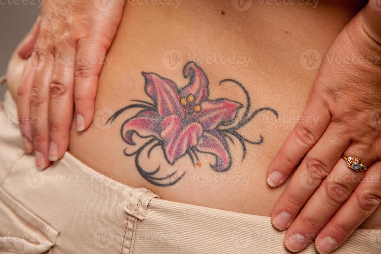 Woman showing tattoo art photo