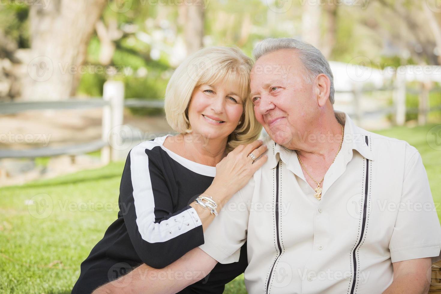 Affectionate Senior Couple Portrait At The Park photo