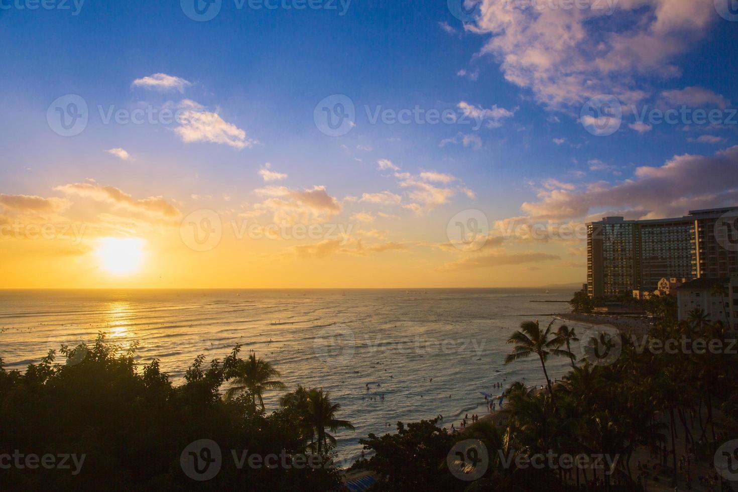 Beautiful Sunset at Waikiki Beach in Hawaii photo