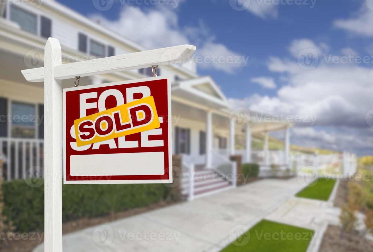 Sold Home For Sale Real Estate Sign and House photo