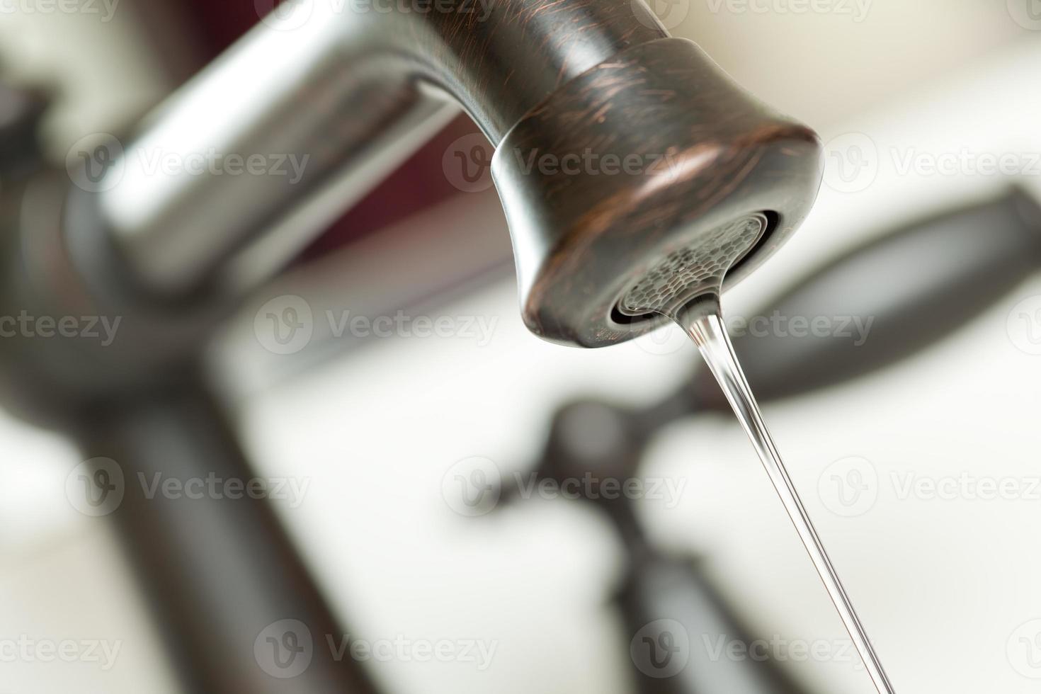 Water Dripping from Water Faucet photo