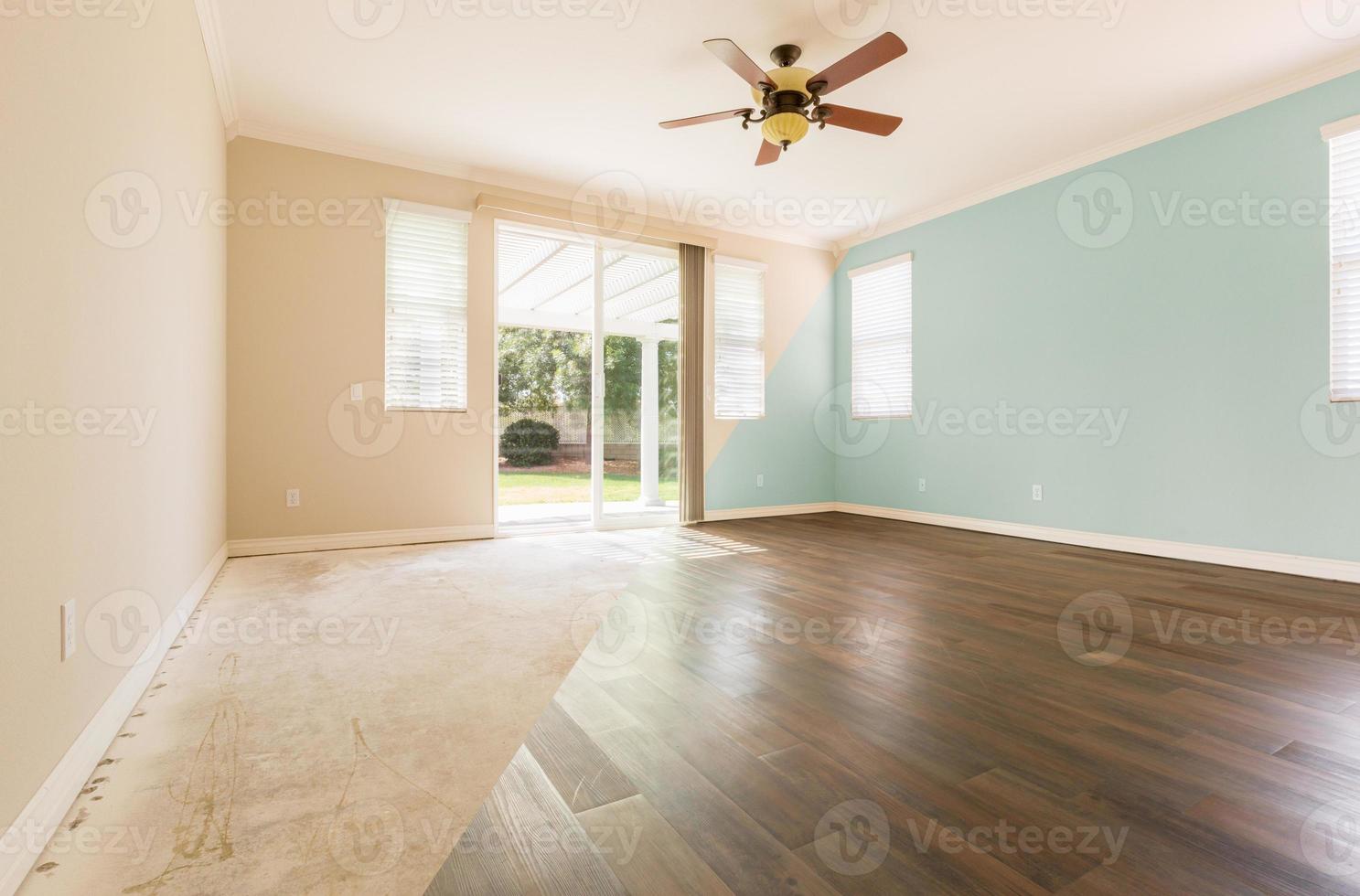 Empty Room with Cross Section Showing Before and After With New Wood Floor and Paint photo