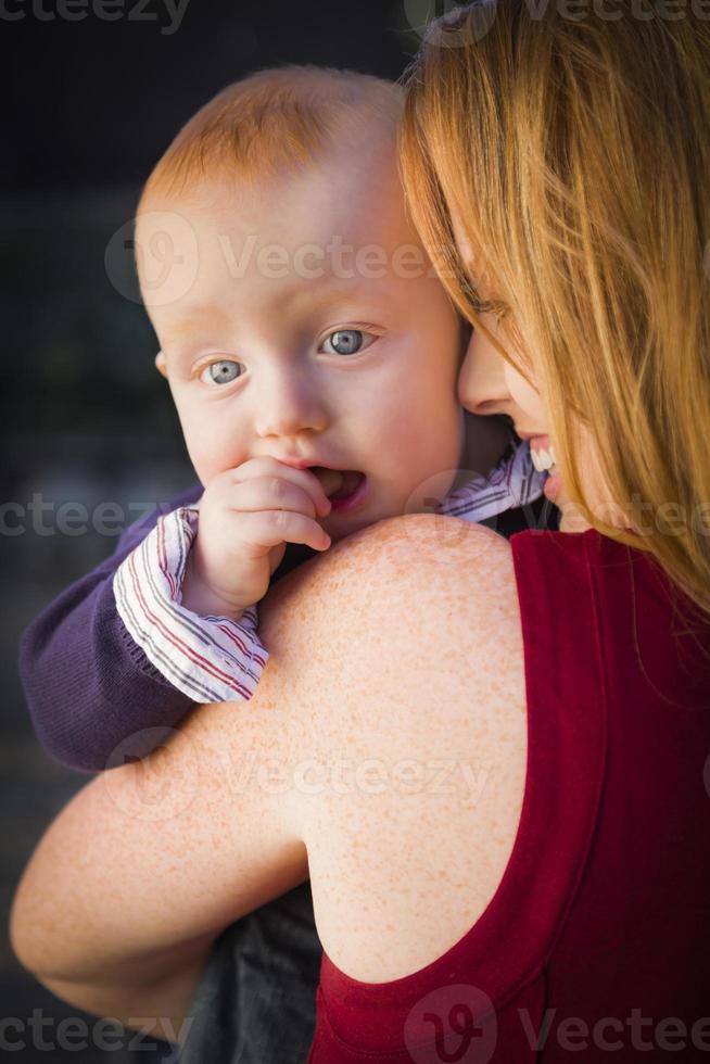 Cute Red Head Infant Boy Portrait with His Mother photo