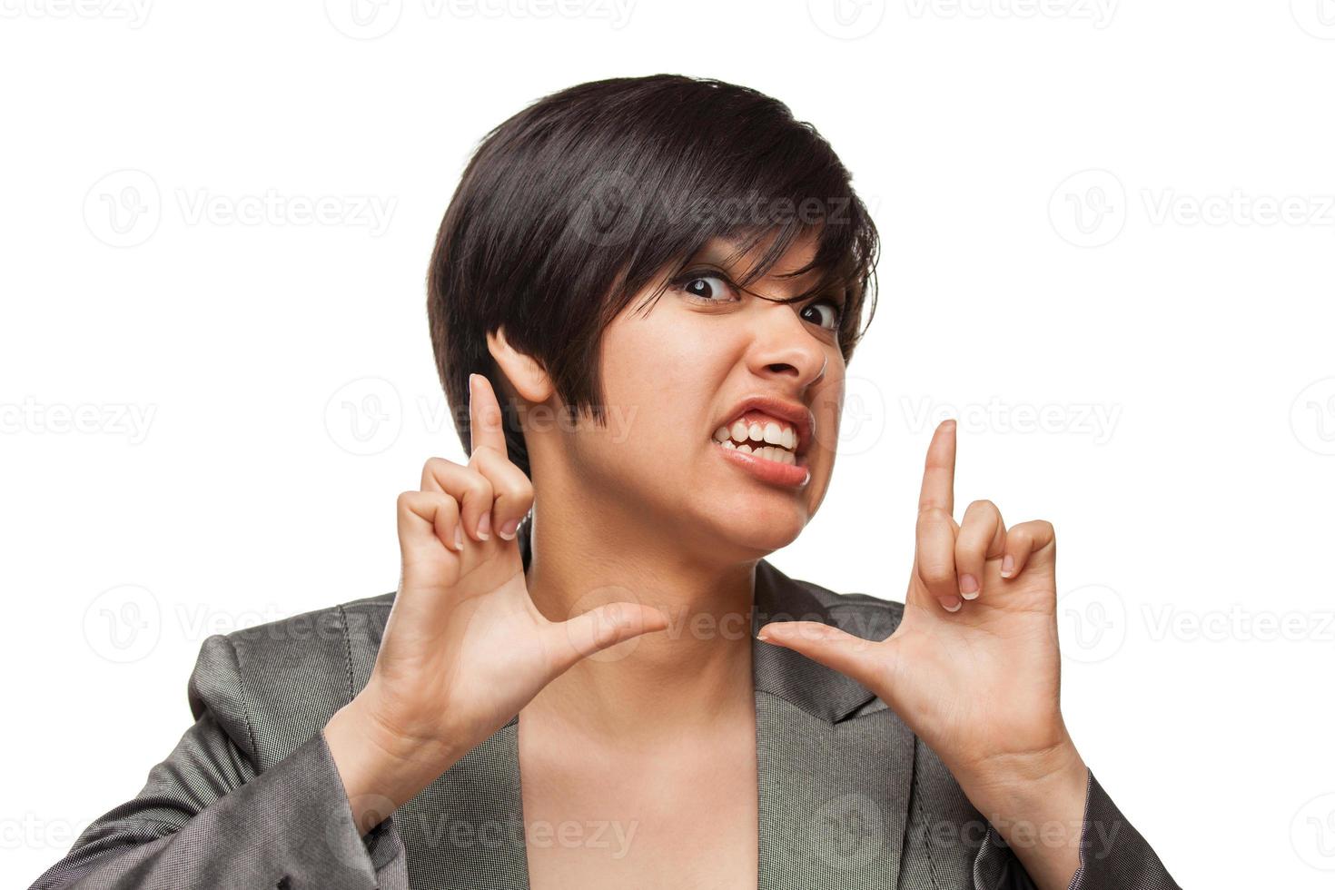 Goofy Biracial Girl Framing Her Face with Her Hands Isolated Against White Background. photo