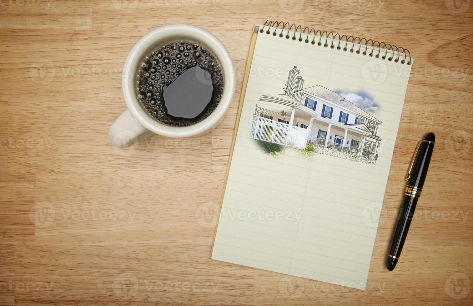 Pad of Paper with House Drawing, Pen and Coffee photo