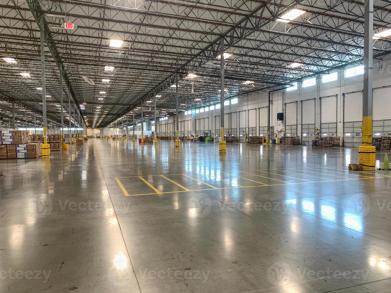 Massive Empty Industrial Warehouse Interior photo