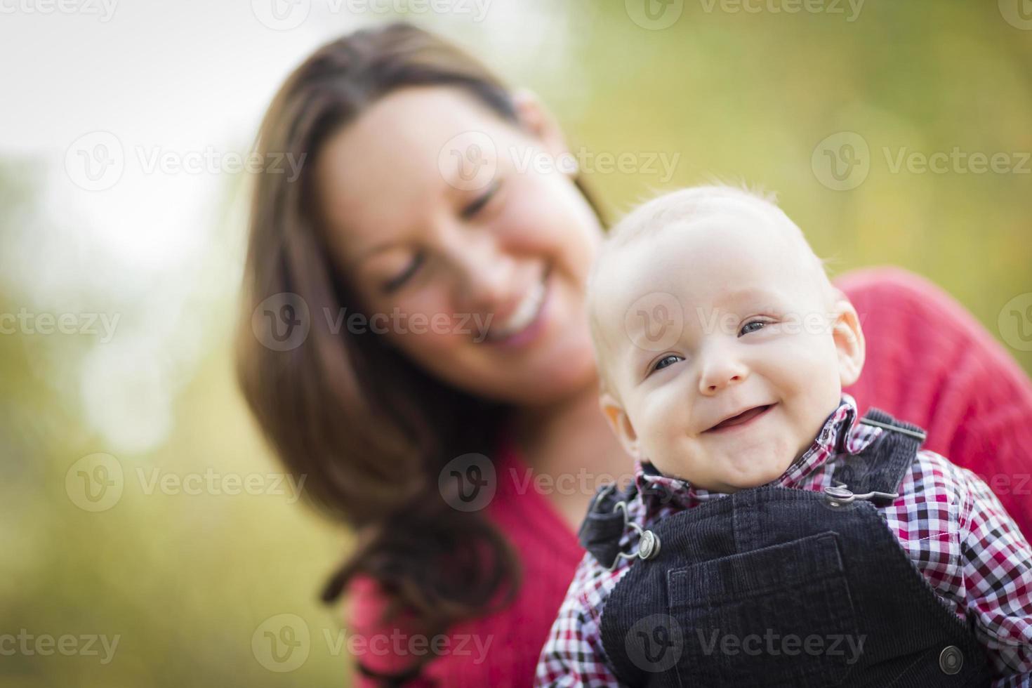 Little Baby Boy Having Fun With Mommy Outdoors photo