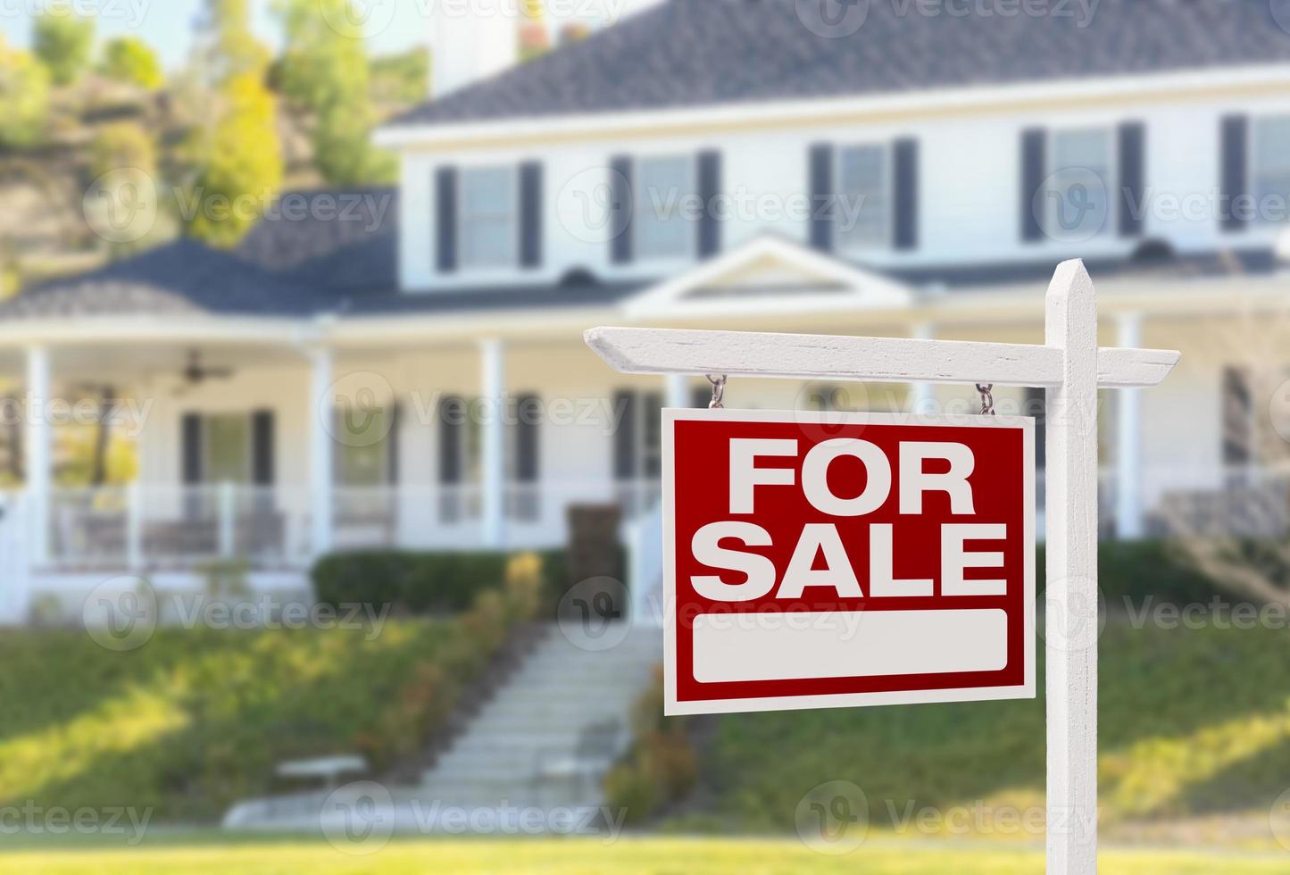 Home For Sale Sign in Front of New House photo