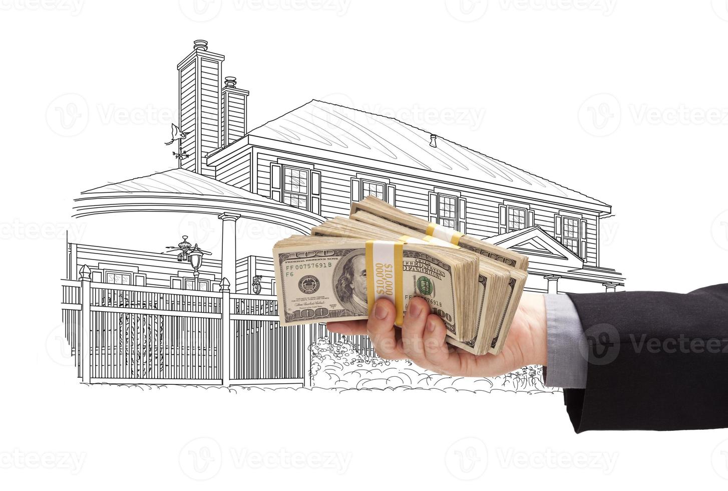 Hand Holding Thousands In Cash Over House Drawing photo