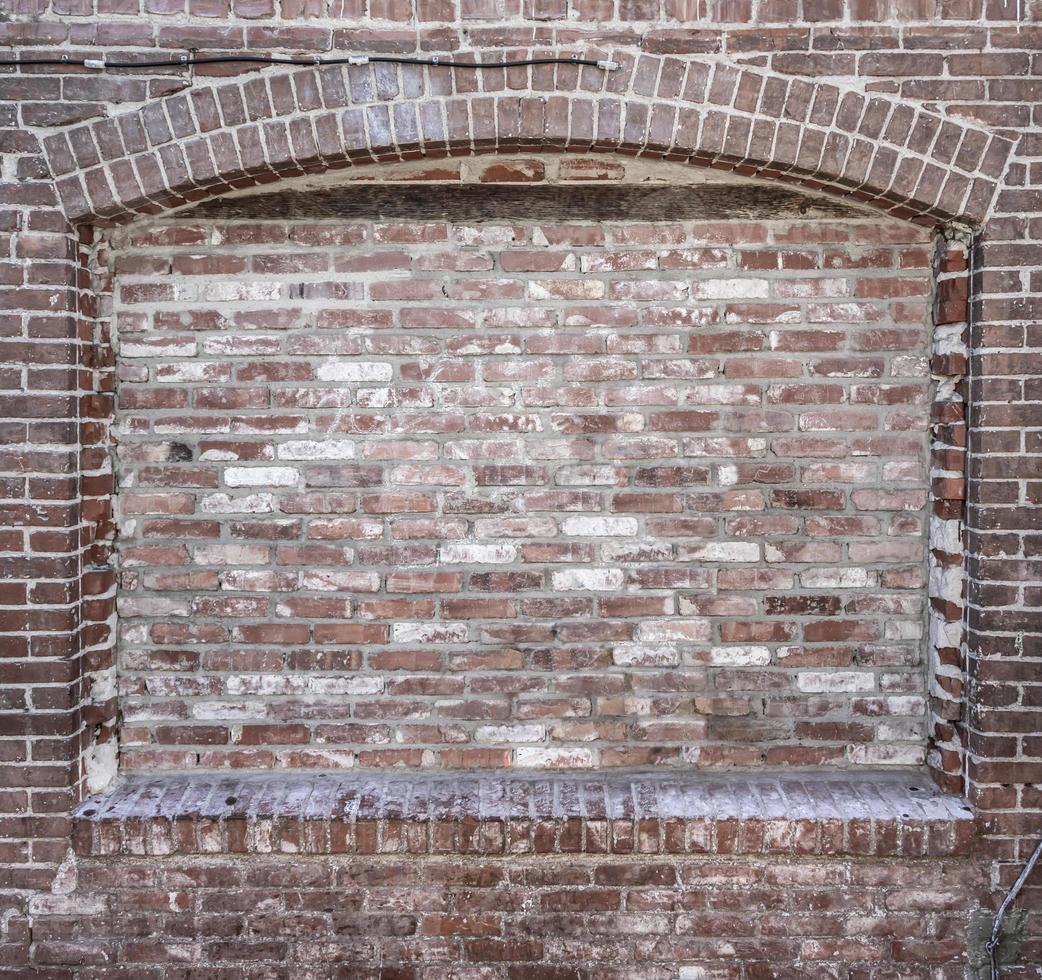 Grungy Blank Brick Wall with Inset Background photo