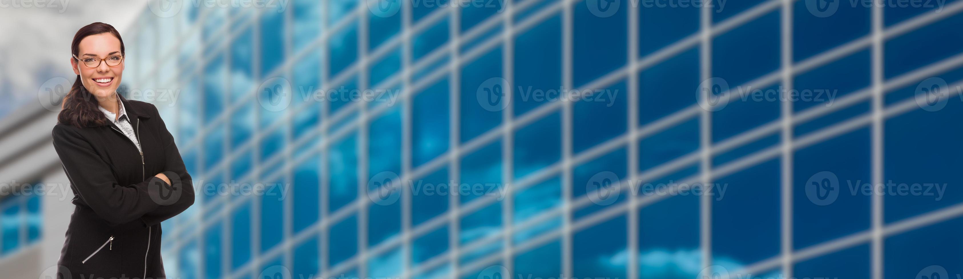 Mixed Race Businesswoman In Front of Corporate Building Banner photo