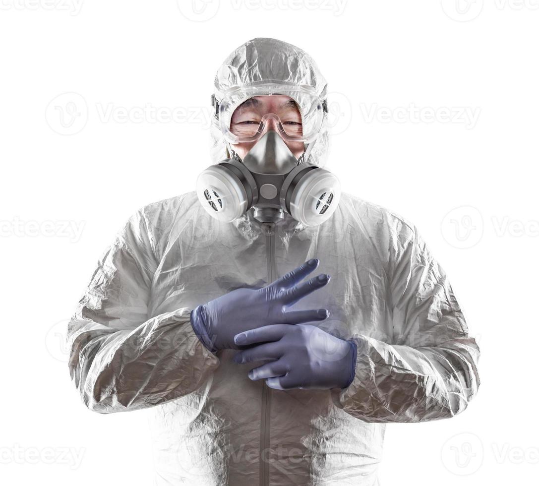 Chinese Man Wearing Hazmat Suit, Goggles and Gas Mask Isolated On White photo