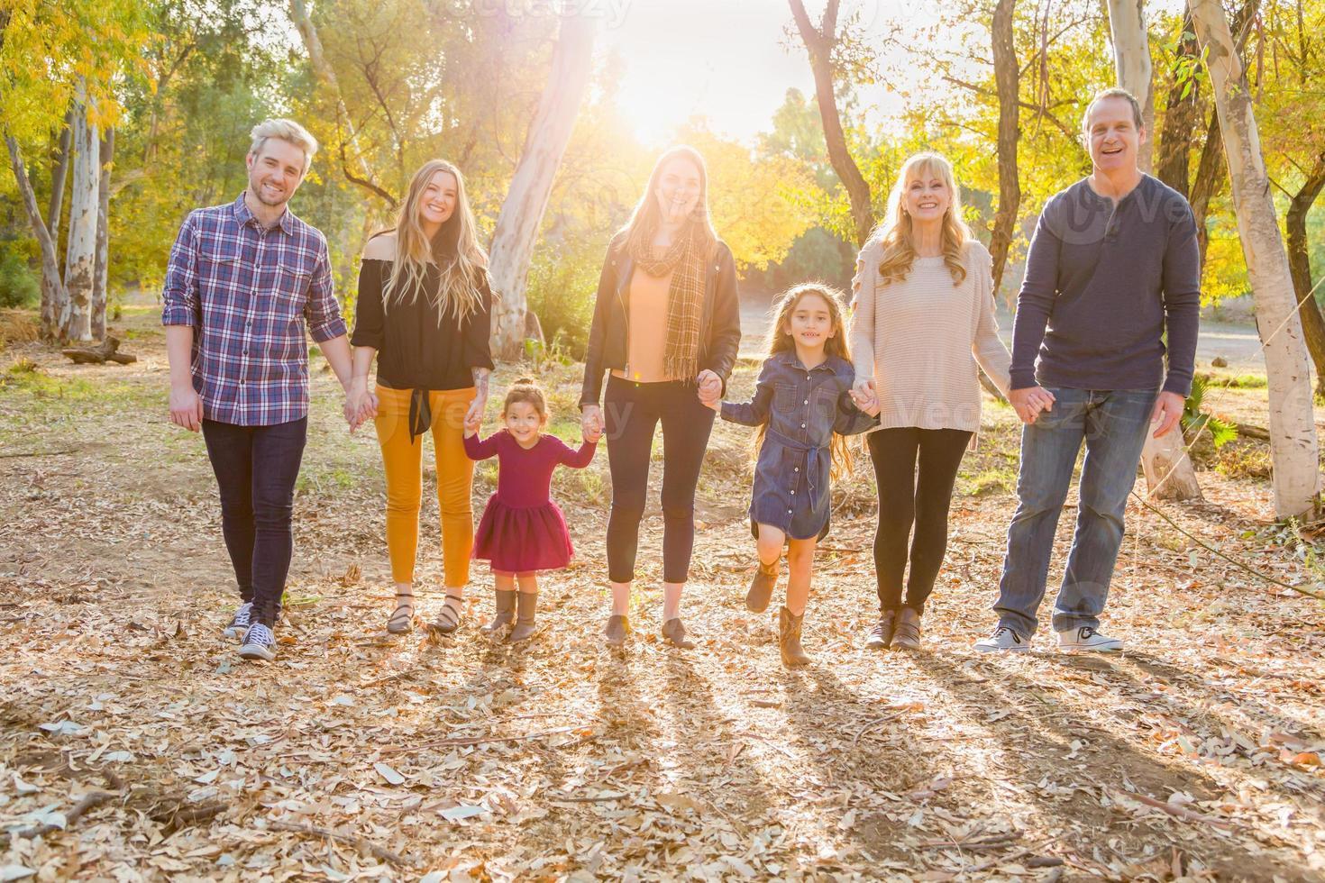 Multigenerational Mixed Race Family Portrait Outdoors photo