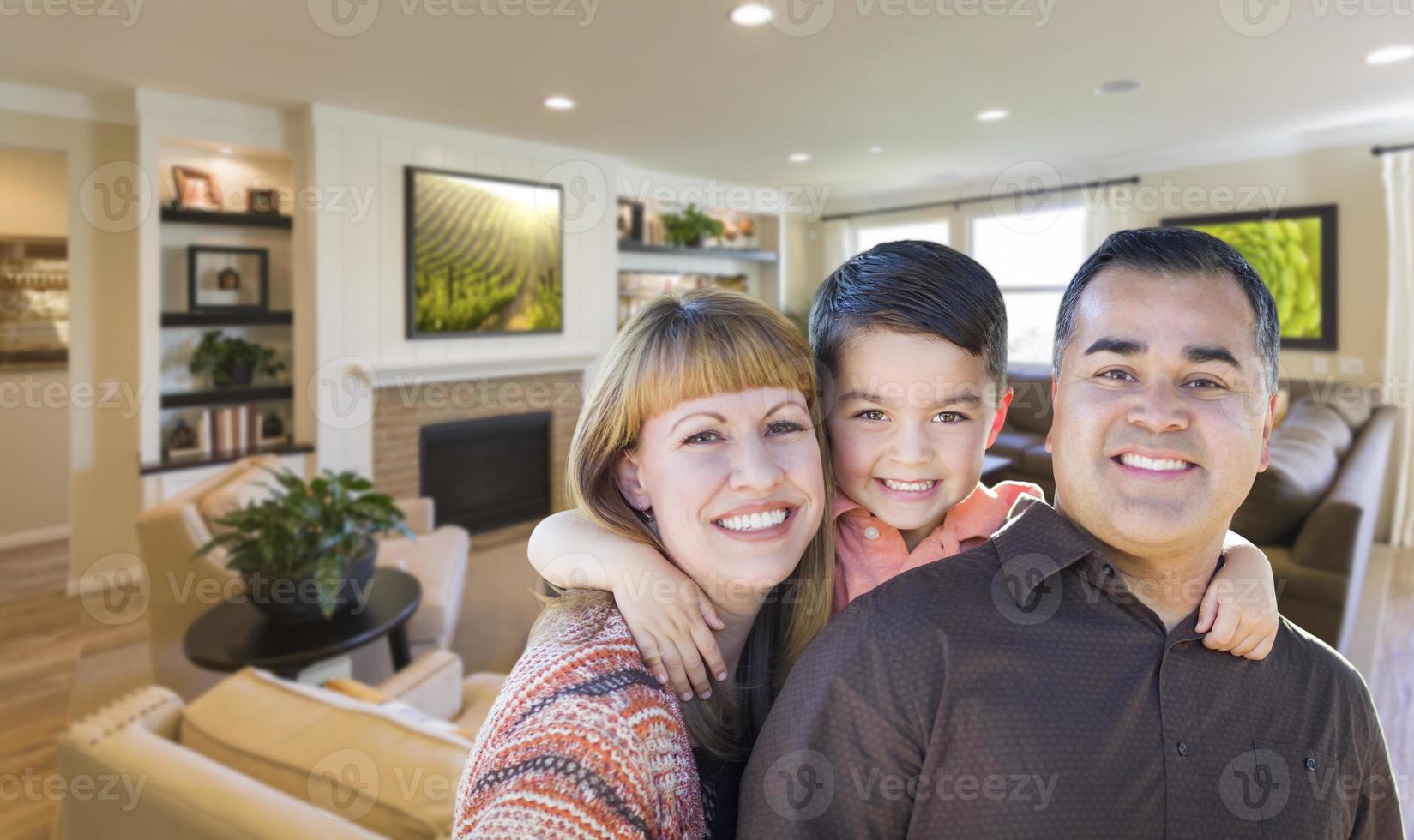 Young Mixed Race Family Portrait In Living Room of Home photo