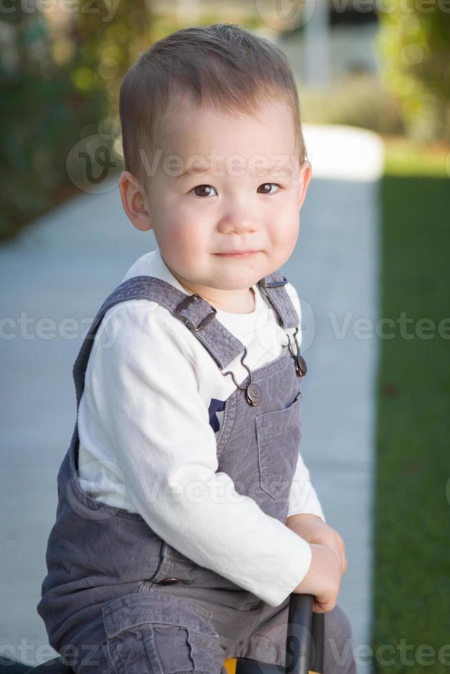Young Mixed Race Chinese and Caucasian Baby Boy Having Fun Outdoors photo