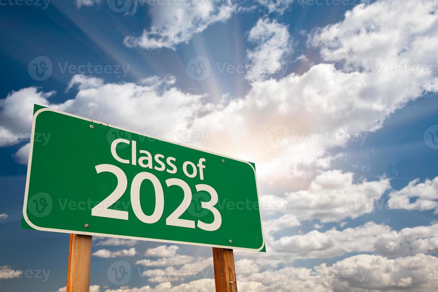 Class of 2023 Green Road Sign with Dramatic Clouds and Sky photo