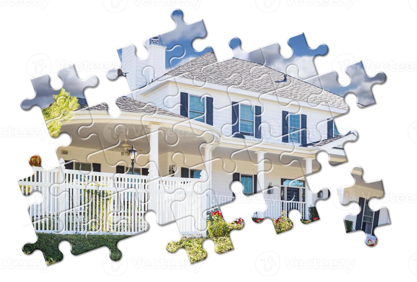 New Home Within Puzzle Pieces Isolated on White. photo