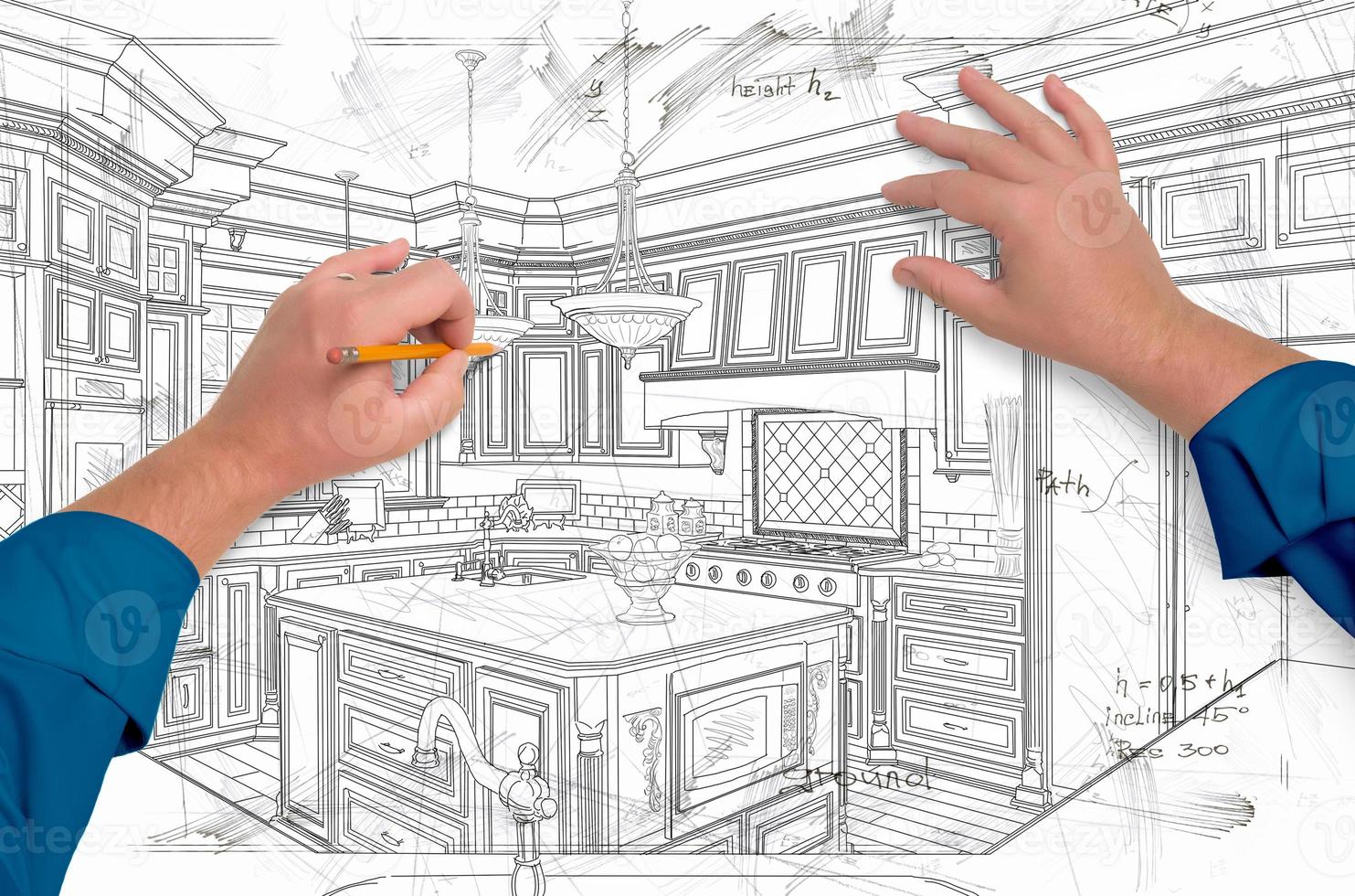 manos masculinas dibujando detalles de diseño de cocina personalizados foto