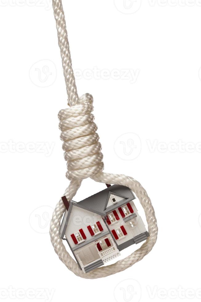 House Tied Up and Hanging in Hangman's Noose on White photo