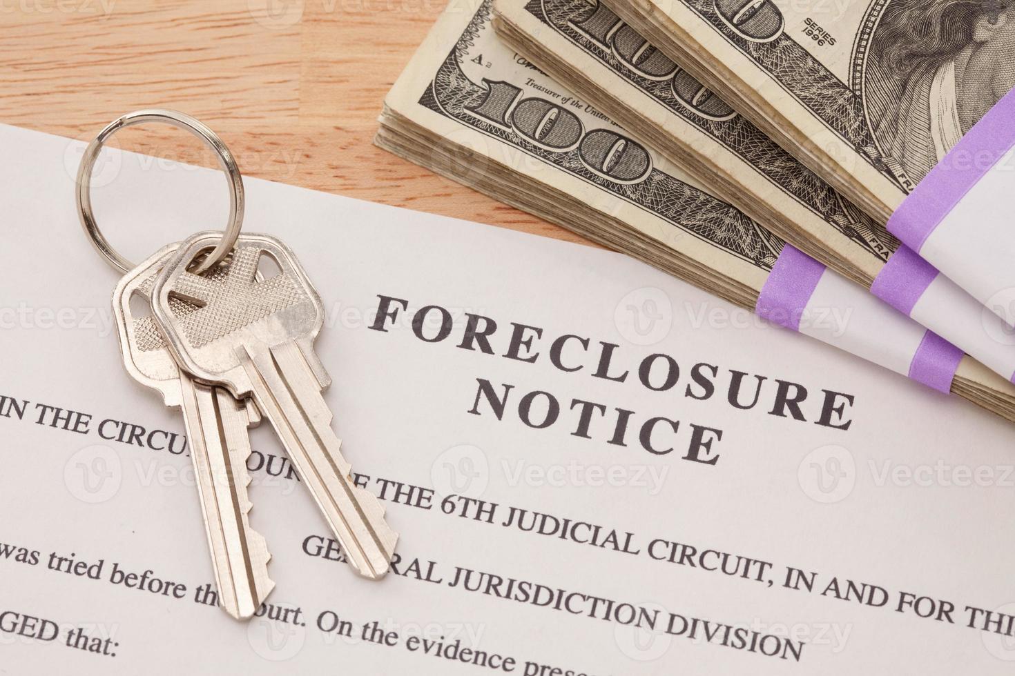 House Keys, Stack of Money and Foreclosure Notice photo