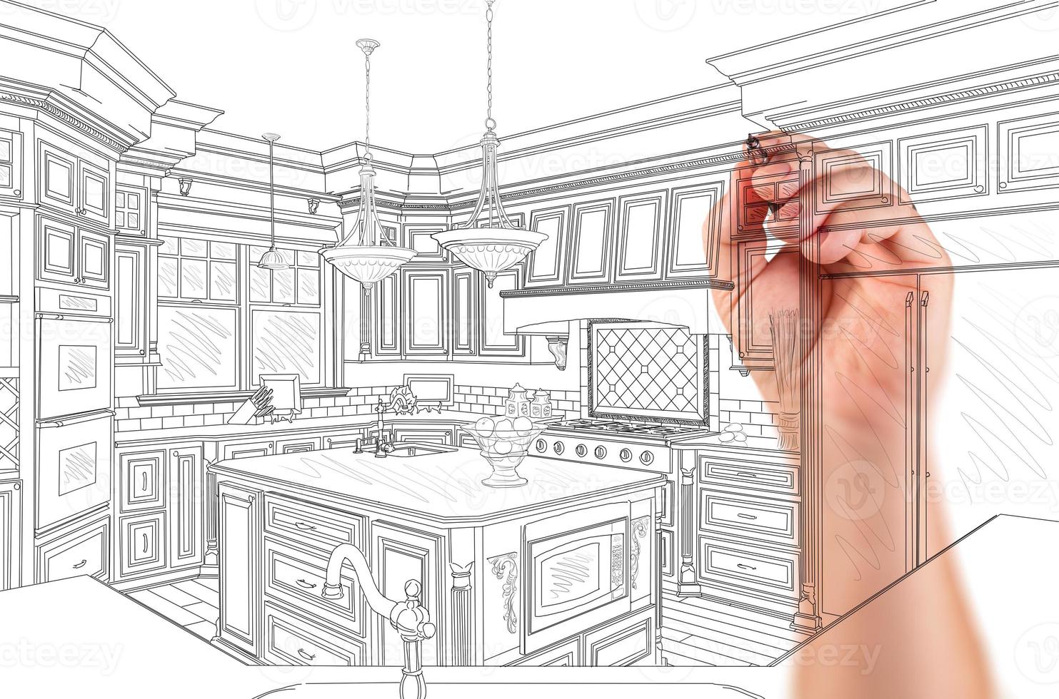 Hand of Architect Drawing Detail of Custom Kitchen Design photo