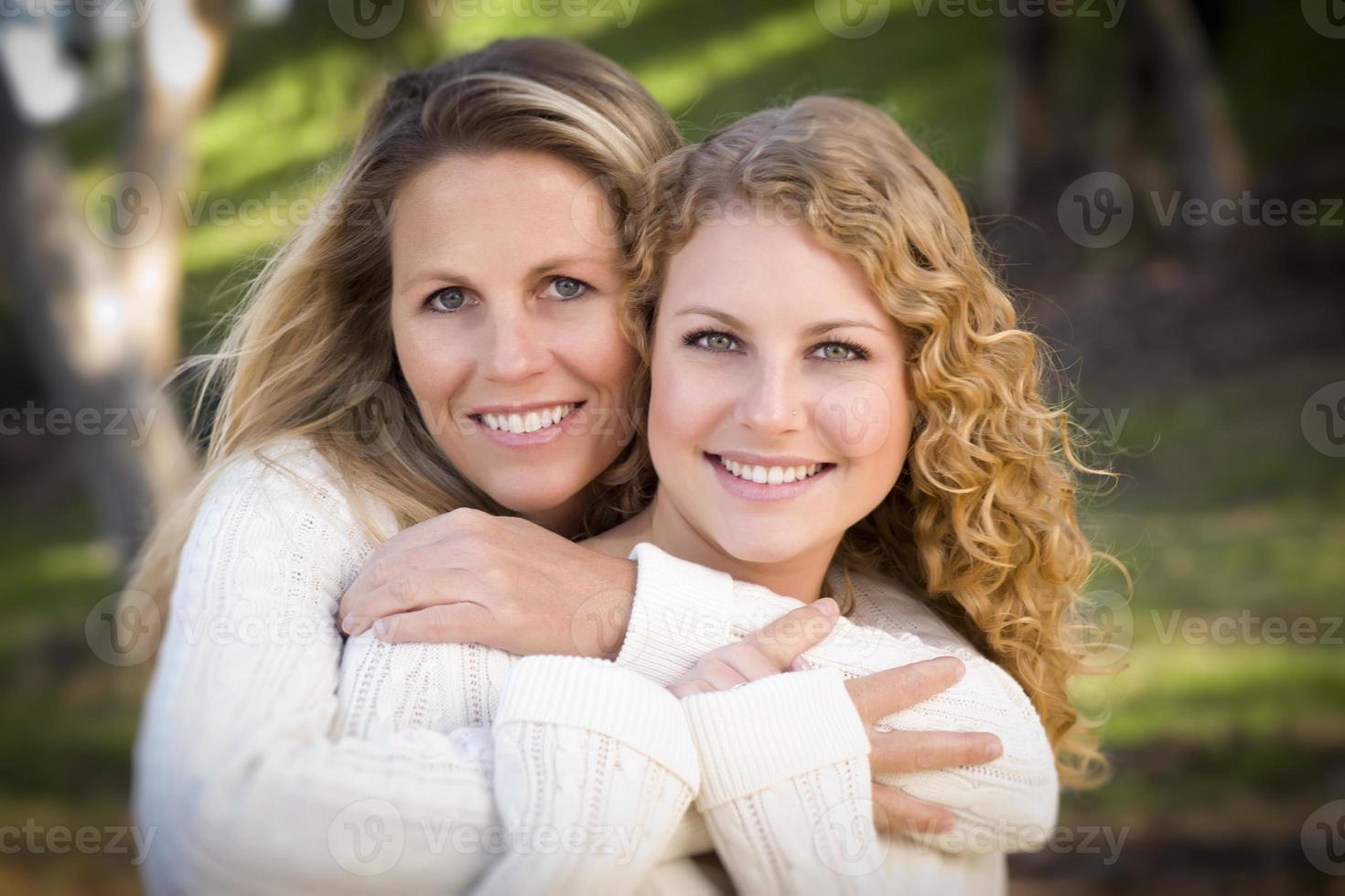 Pretty Mother and Daughter Portrait in Park photo