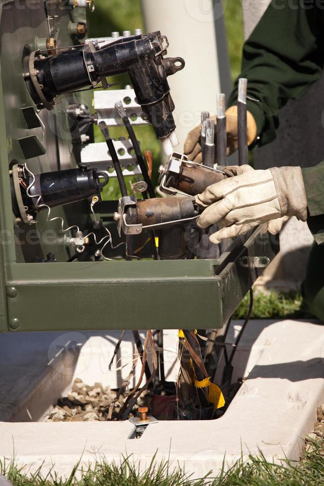 Utility Workers Installing New Electrical Equipment photo