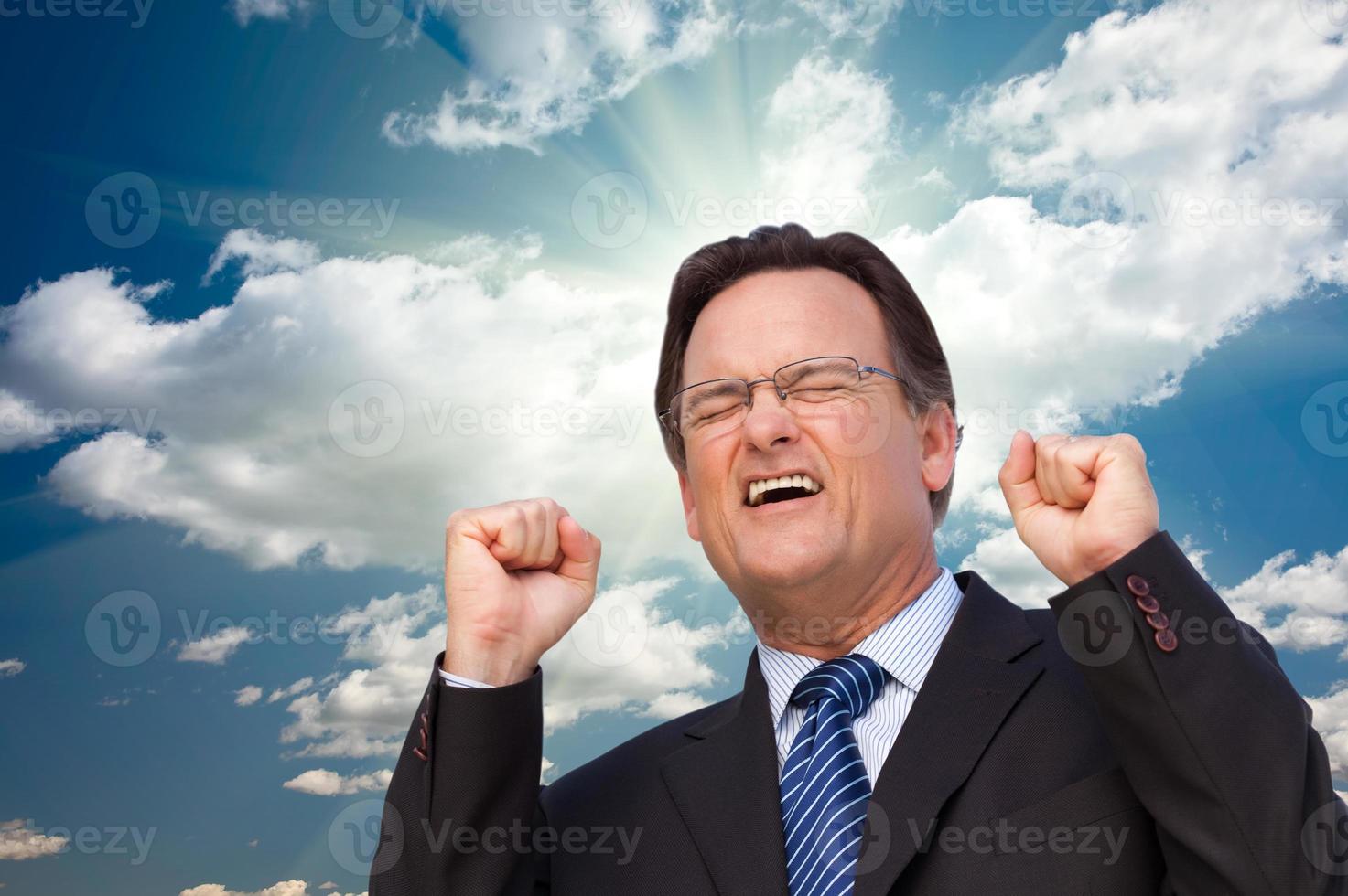 Excited Businessman  Expresses His Excitement Outside photo