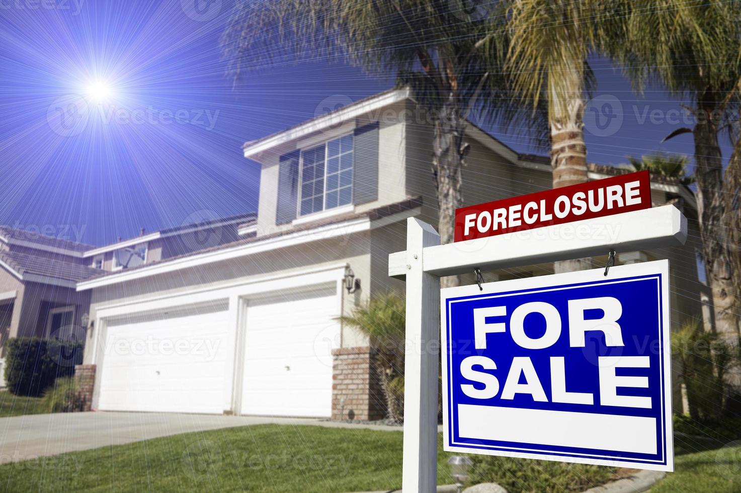 Red Foreclosure For Sale Real Estate Sign and House photo