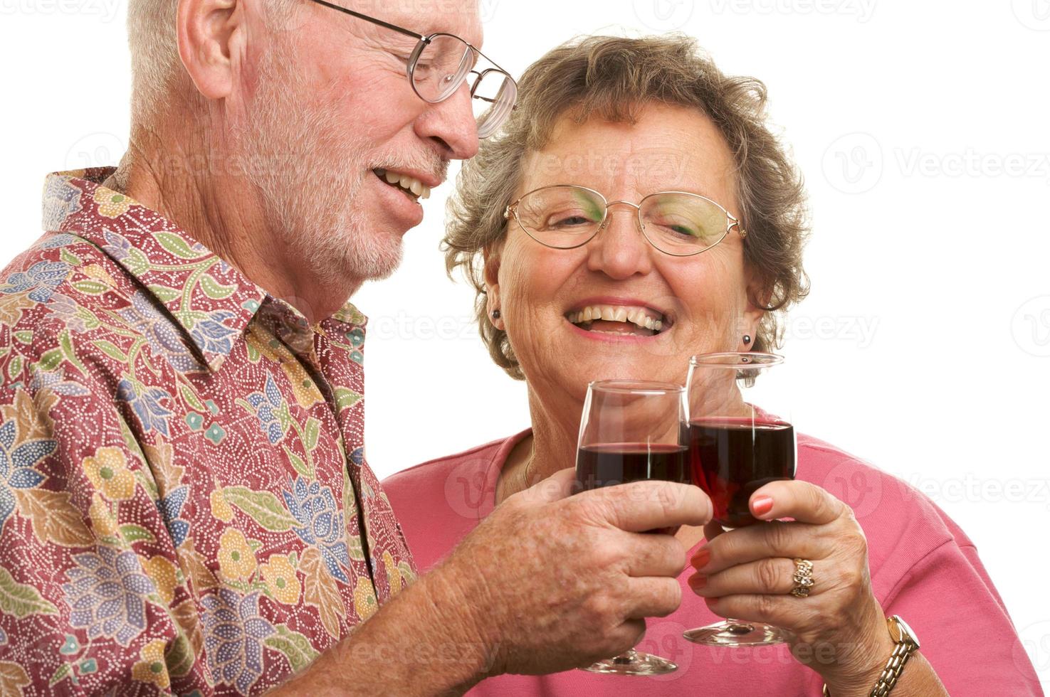 Happy Senior Couple Toasting photo