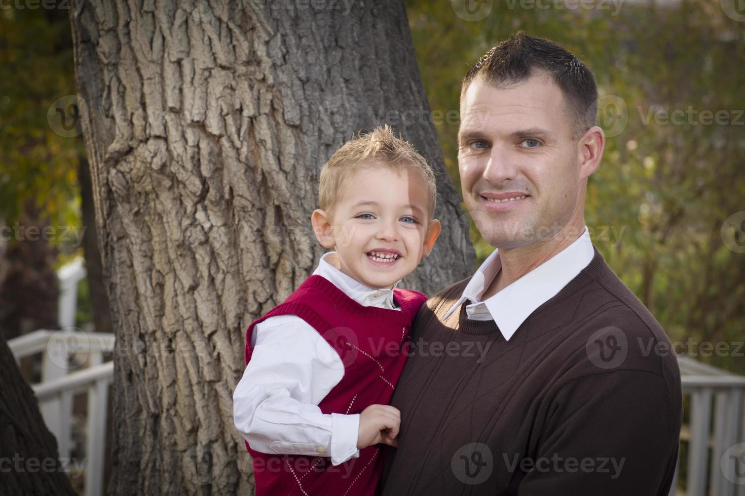 Handsome Father and Son in the Park photo