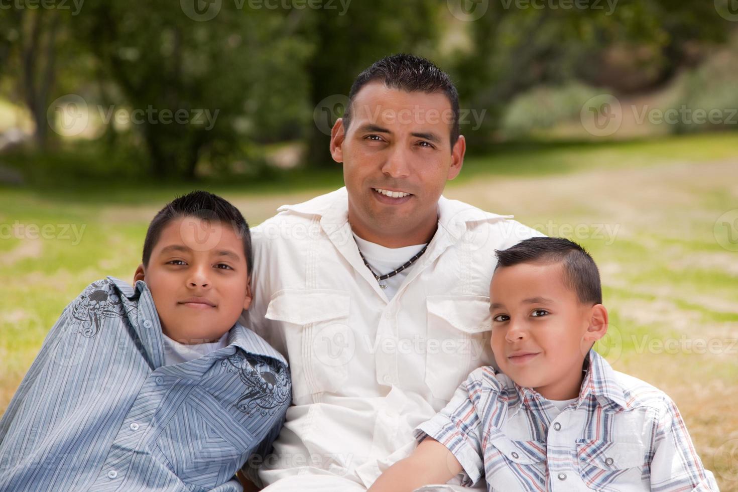 Father and Sons in the Park photo