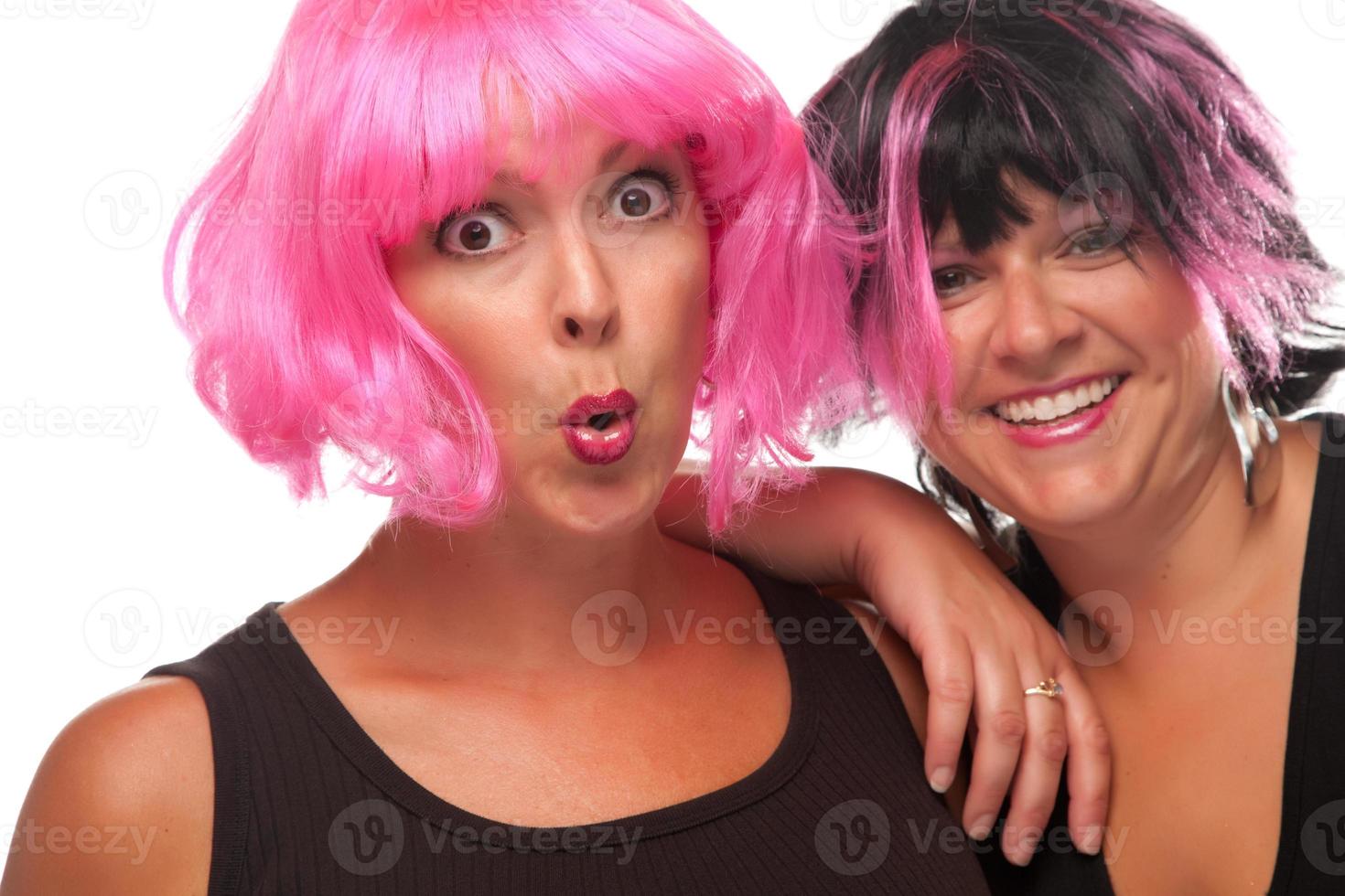 Portrait of Two Pink And Black Haired Smiling Girls photo