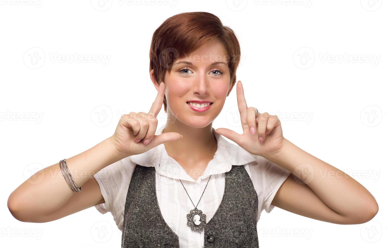 Pretty Young Adult Female Framing Face with Fingers photo