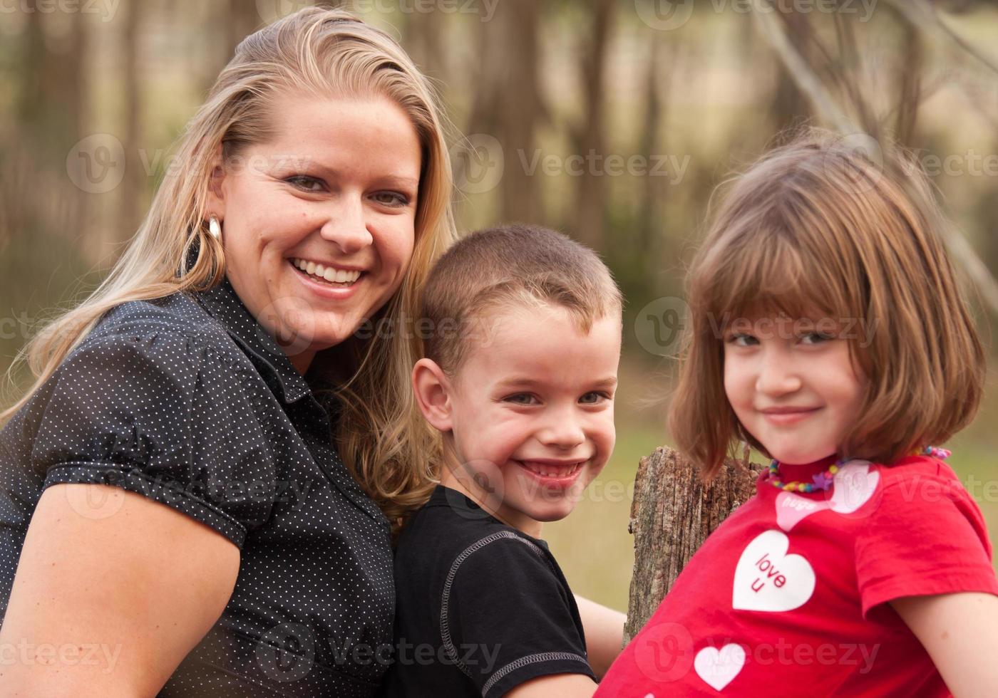 Mother and Children Portrait Outdoors photo