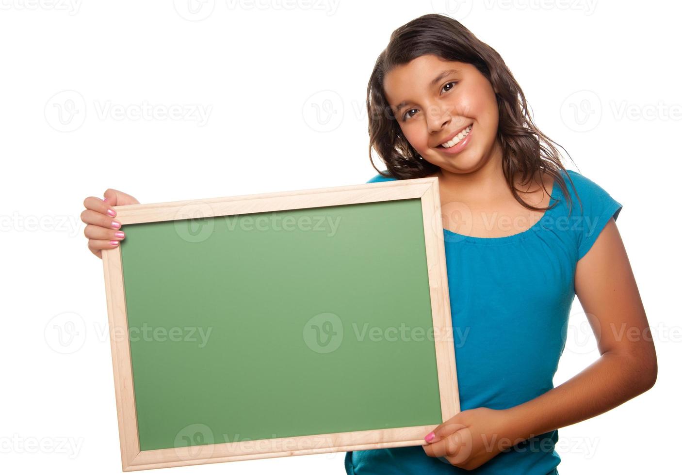 Pretty Hispanic Girl Holding Blank Chalkboard photo