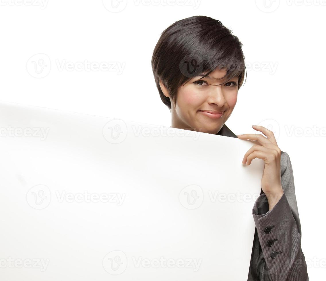 Mixed Race Young Adult Female Holding Blank White Sign photo