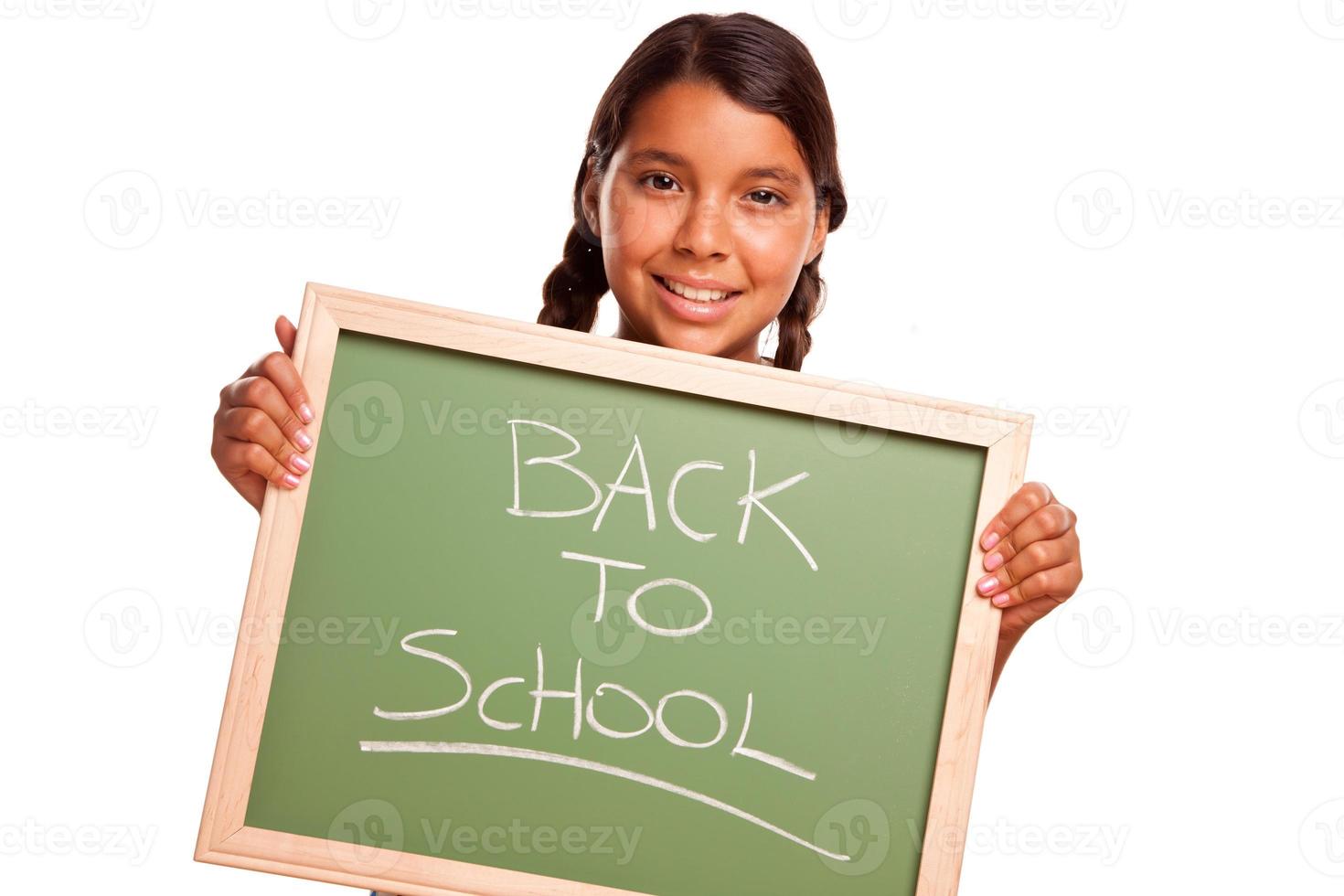 Pretty Hispanic Girl Holding Chalkboard with Back To School photo